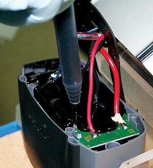 Ab Máquina de envasado de resina de poliuretano para piezas electrónicas Panel de panal de miel